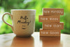 mug sitting on table outside that says 