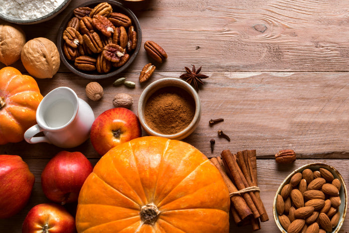 various fall foods, like pumpkins, apples, cinnamon, and nuts, that help fight inflammation.