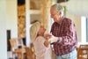 an older couple dancing together