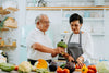 senior couple preparing a healthy meal in the kitchen